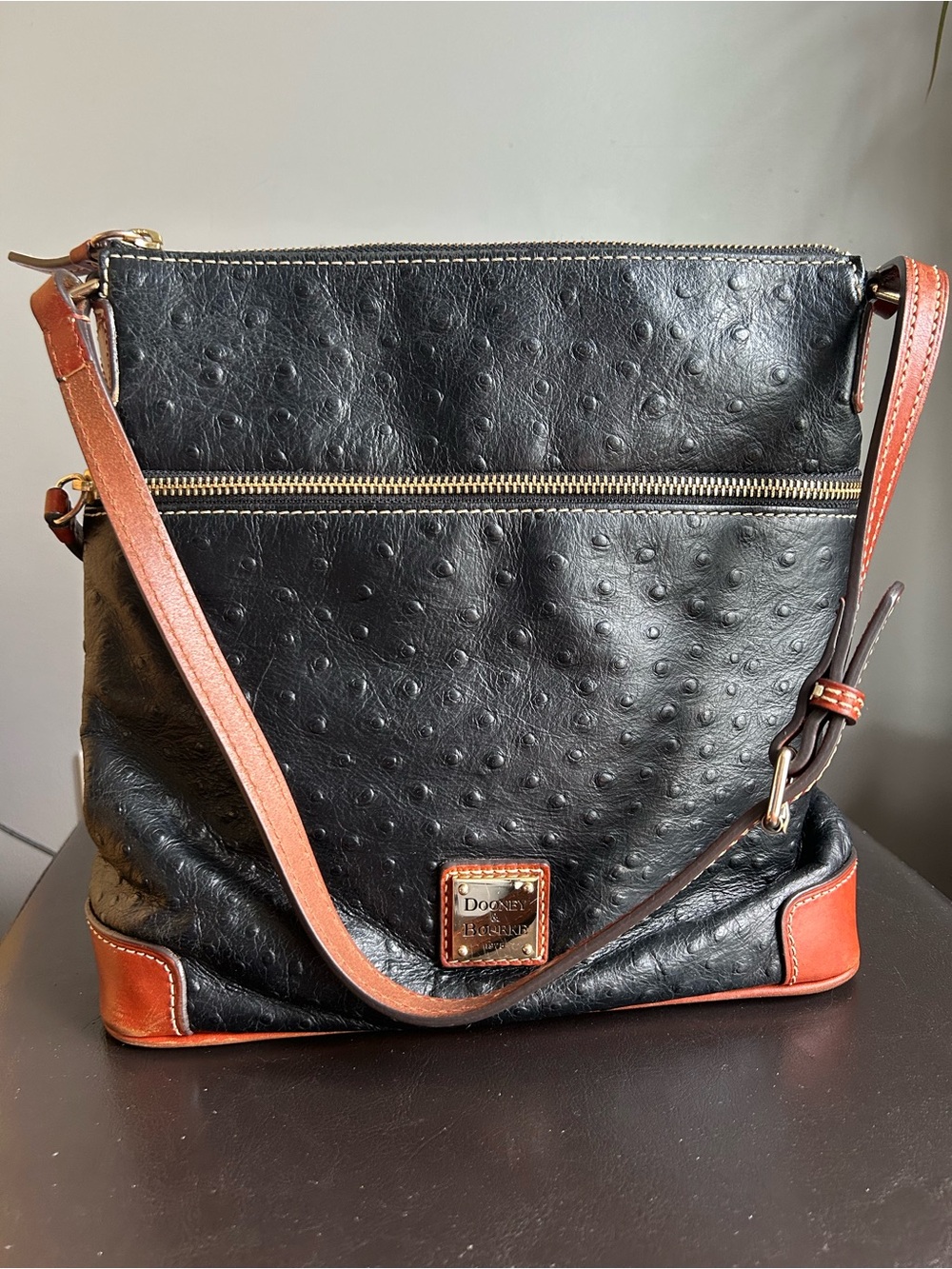 Dooney & Bourke Vintage Black Ostrich-Embossed Crossbody with Brown Trim